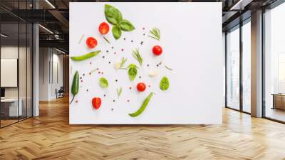 Fresh herbs with vegetables and spices on light background Wall mural