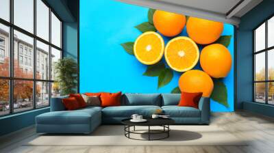 Fresh oranges on color background Wall mural