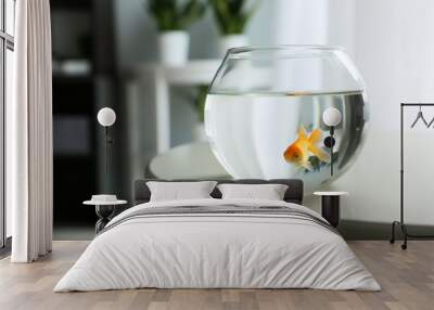 Glass fishbowl on table Wall mural