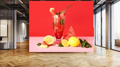 Glass of fresh watermelon lemonade with mint on pink table Wall mural