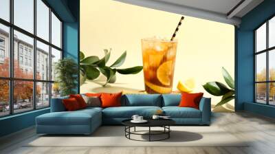 Glass of tasty Long Island iced tea on color background Wall mural