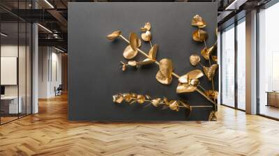 Golden leaves on black background Wall mural