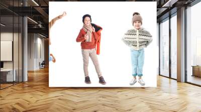 Group of adorable little children in winter clothes on white background Wall mural