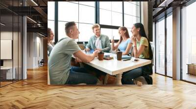 Group of students preparing for exam in university Wall mural