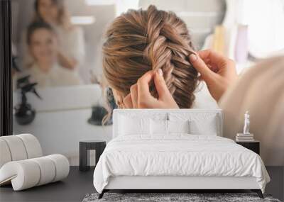 Hairdresser working with client in beauty salon Wall mural