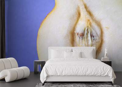 Half of fresh juicy pear on color background, closeup. Erotic concept Wall mural