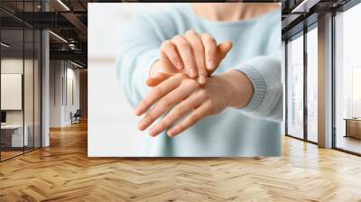 Hands of beautiful young woman at home, closeup Wall mural