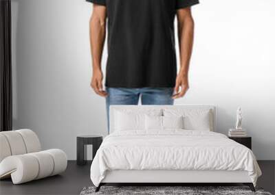 Handsome young man in stylish t-shirt isolated on white Wall mural