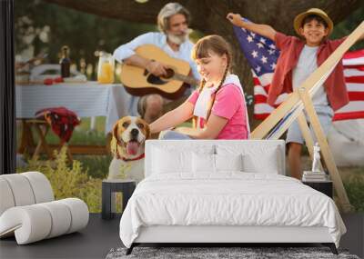 Happy family at barbecue party on summer day Wall mural