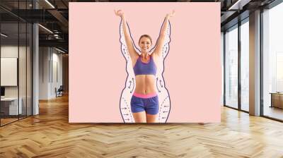 Happy sporty woman after weight loss on color background Wall mural