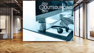 Headset at workplace of technical support agent. Concept of outsourcing Wall mural