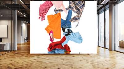 Heap of different clothes on white background Wall mural