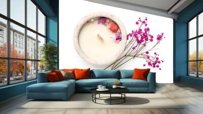 Holder with candle and flowers on white background Wall mural