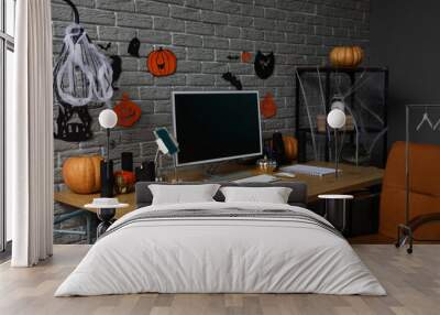 Interior of dark office decorated for Halloween with workplace and shelf unit Wall mural