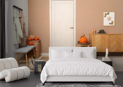 Interior of hallway with autumn decor, door and soft bench Wall mural