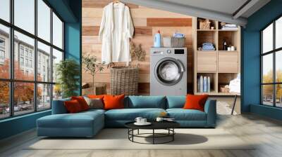 Interior of home laundry room with modern washing machine Wall mural