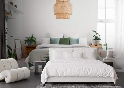 Interior of light bedroom with houseplants and poufs Wall mural