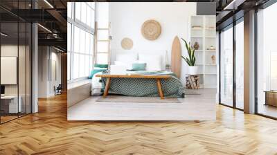 Interior of light bedroom with wooden surfboard, bench and shelving unit Wall mural