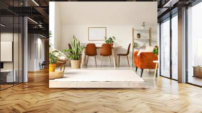 Interior of light living room with chairs, sofa and houseplants Wall mural