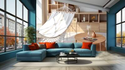 Interior of light living room with hammock and coffee table Wall mural