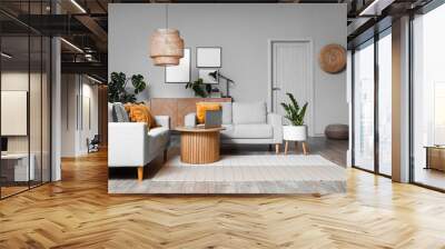 Interior of living room with green houseplants and sofas Wall mural