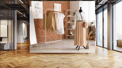 Interior of modern boutique with stylish female clothes and accessories Wall mural