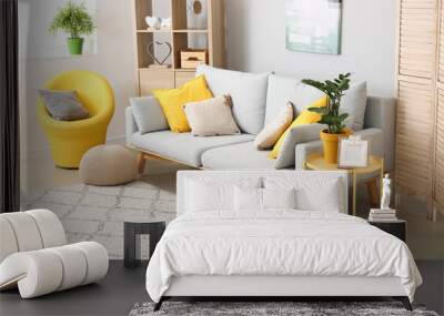 Interior of modern room with comfortable sofa Wall mural