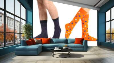 Legs of people in different socks on white background Wall mural