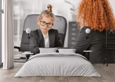 Little businesswoman working with client in office Wall mural