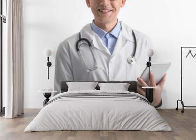 Male medical assistant with tablet computer smiling on white background Wall mural