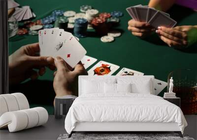 Male player at table in casino Wall mural