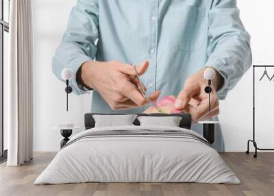 Man cutting his credit card on white background. Bankruptcy concept Wall mural