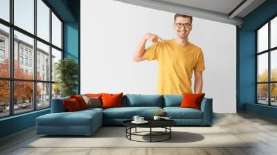 Man in stylish t-shirt on grey background Wall mural