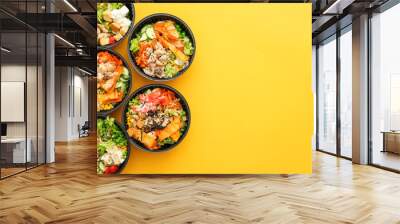 Many containers with delicious food on color background Wall mural