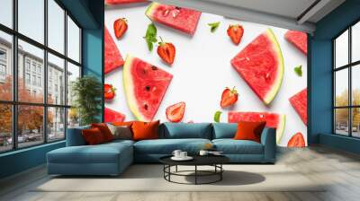 Many slices of watermelon with strawberry and mint on white background Wall mural