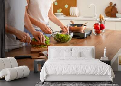 Mature couple cooking in kitchen, closeup Wall mural