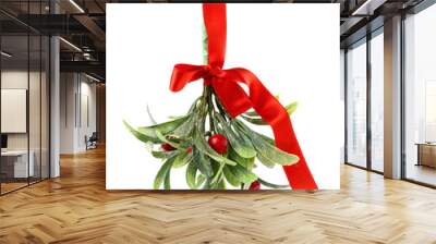 Mistletoe branch with bow on white background Wall mural