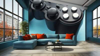 Modern game pad on color background, closeup Wall mural