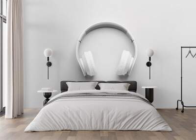 Modern headphones on light background Wall mural