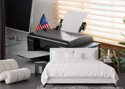 Modern printer with USA flag on desk near window in office Wall mural