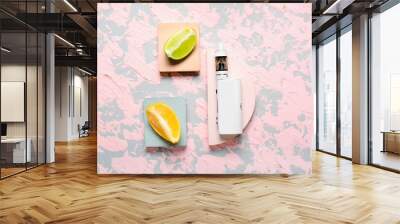 Modern vape mod and fruits on pink background Wall mural