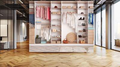 Modern wardrobe with stylish spring clothes and accessories Wall mural