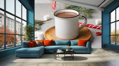 mug of tasty hot chocolate and christmas decor on light background Wall mural