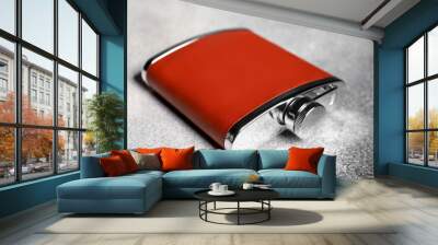 New hip flask on grunge background, closeup Wall mural