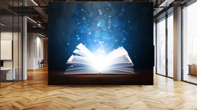 Open magic book on dark background Wall mural