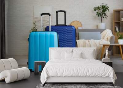 Packed suitcases in interior of living room Wall mural