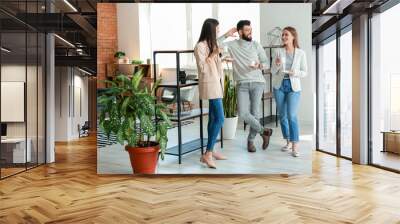 People having coffee break in office Wall mural