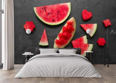 Pieces of fresh watermelon on black background Wall mural