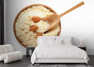 Plate and scoop with almond flour on white background Wall mural