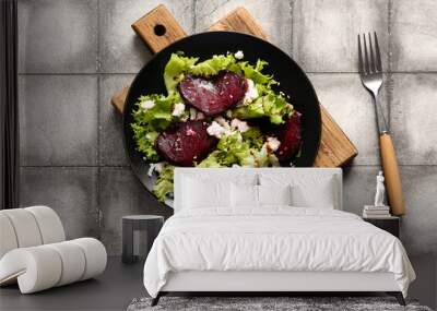 Plate of fresh salad with beet and cottage cheese on grey tile background Wall mural